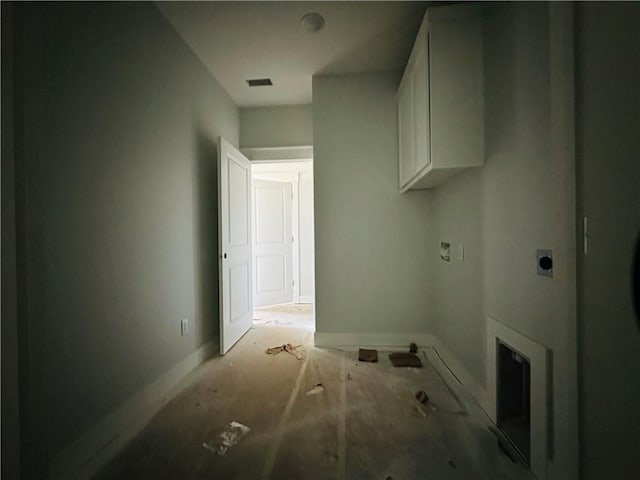 2550 Peterson Rd, Gentry, AR 72734 - laundry area featuring electric dryer hookup, visible vents, and cabinet space