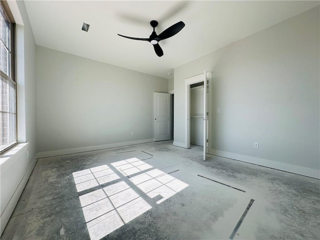 2550 Peterson Rd, Gentry, AR 72734 - unfurnished bedroom featuring baseboards and a ceiling fan