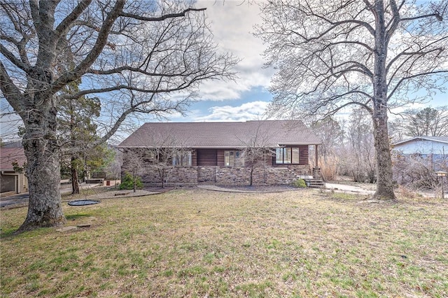 ranch-style house with a front lawn