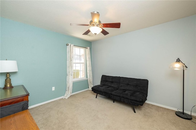 33 Rountree Dr, Bella Vista, AR 72715 - living area featuring carpet, a ceiling fan, and baseboards