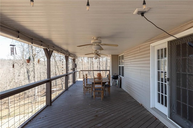 33 Rountree Dr, Bella Vista, AR 72715 - deck with outdoor dining space and a ceiling fan