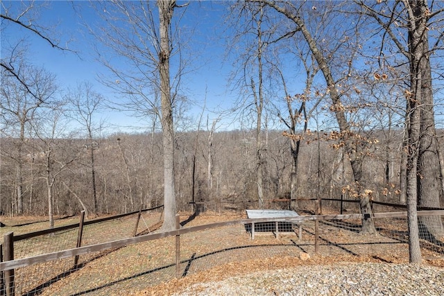 33 Rountree Dr, Bella Vista, AR 72715 - view of yard featuring a wooded view