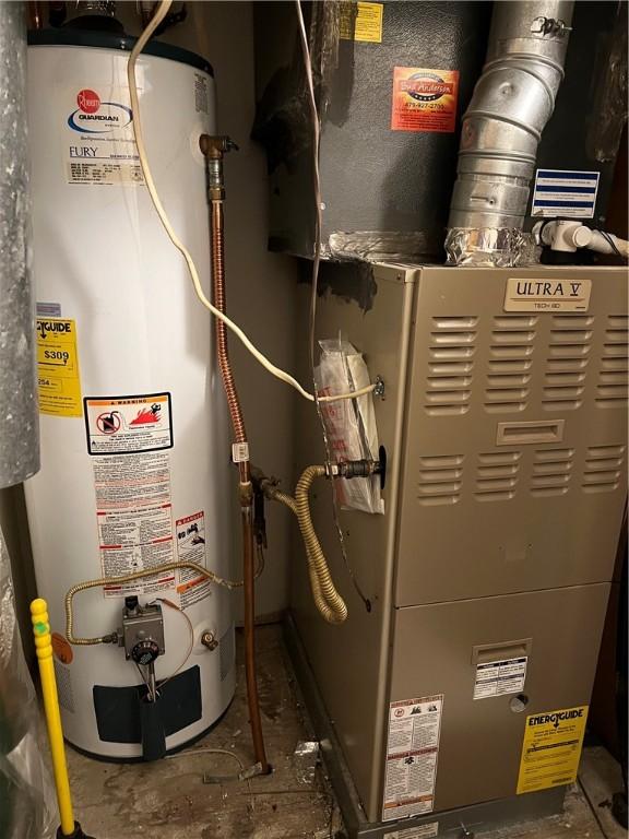 utilities featuring water heater and heating unit