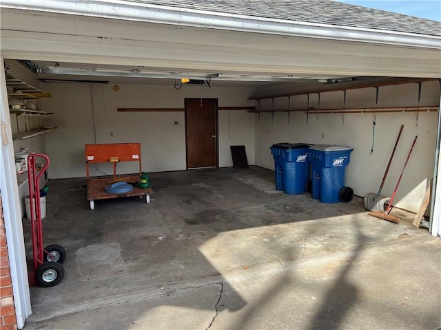 garage featuring a garage door opener