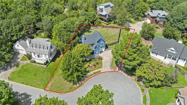 birds eye view of property with a residential view