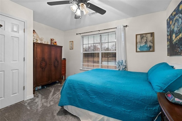 bedroom featuring carpet floors, ceiling fan, and visible vents