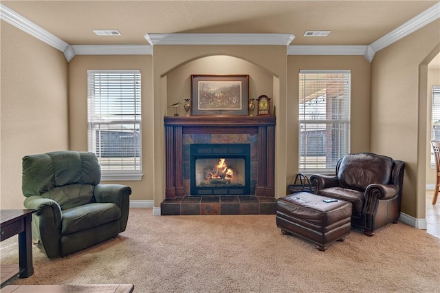 sitting room featuring ornamental molding, carpet, and visible vents