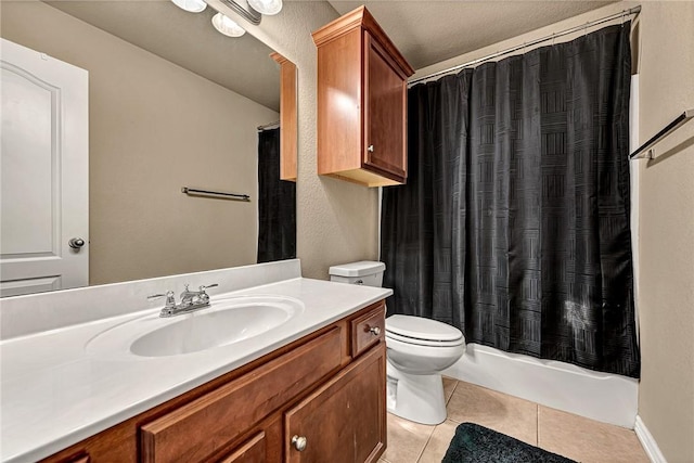 bathroom featuring tile patterned floors, vanity, toilet, and shower / tub combo with curtain