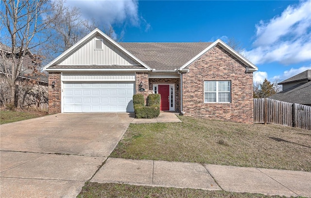 view of front of property featuring an attached garage, brick siding, fence, driveway, and a front lawn