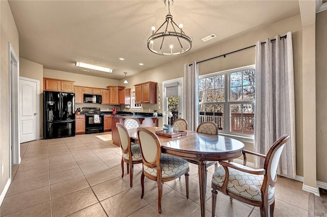dining area featuring visible vents, light tile patterned floors, baseboards, an inviting chandelier, and recessed lighting