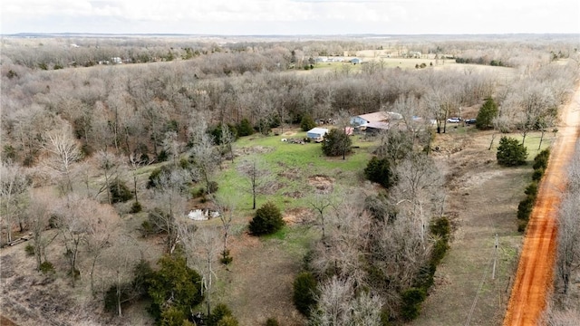 birds eye view of property featuring a rural view