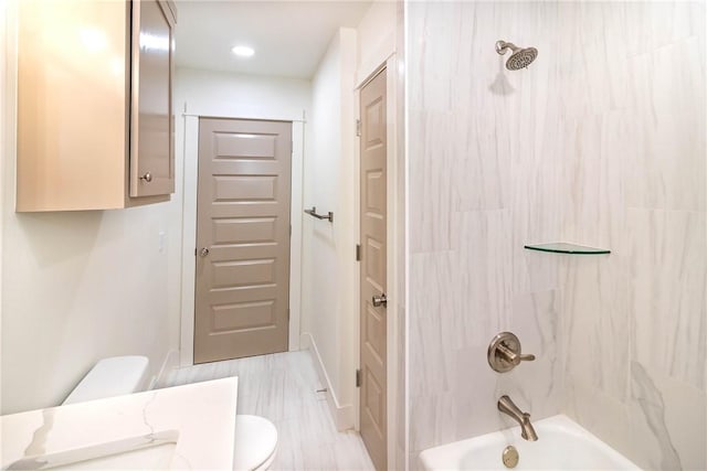 full bathroom featuring shower / washtub combination and toilet