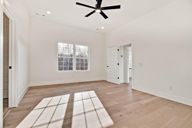 unfurnished room with light wood-style floors, recessed lighting, baseboards, and a ceiling fan