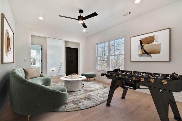 playroom featuring a ceiling fan, visible vents, wood finished floors, and recessed lighting