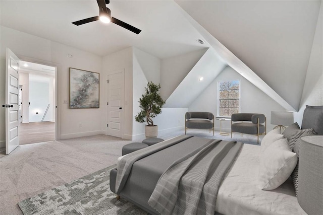 carpeted bedroom with lofted ceiling, ceiling fan, visible vents, and baseboards