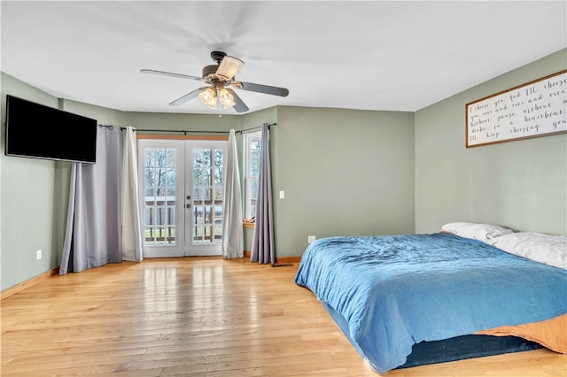 bedroom with french doors, ceiling fan, wood finished floors, access to outside, and baseboards