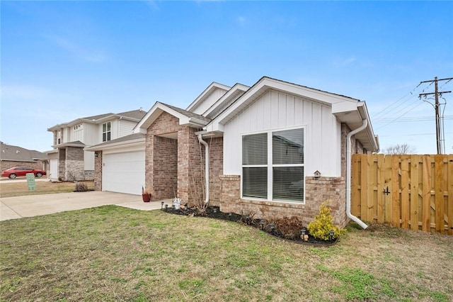 view of front of house featuring brick siding, driveway, a front lawn, and fence