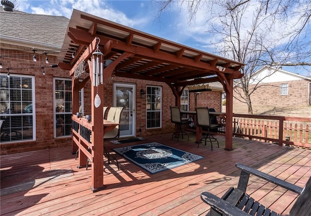 wooden deck with a pergola