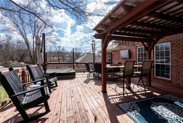 deck with outdoor dining space