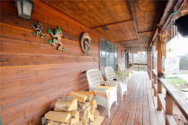 wooden deck featuring covered porch