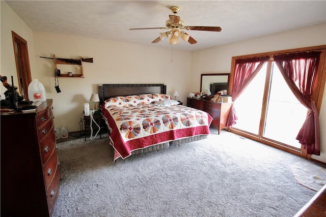 bedroom featuring ceiling fan, carpet, and access to exterior