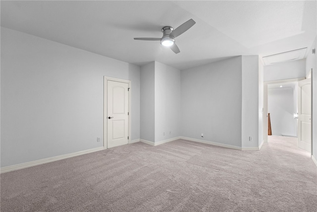 empty room with baseboards, ceiling fan, and carpet floors