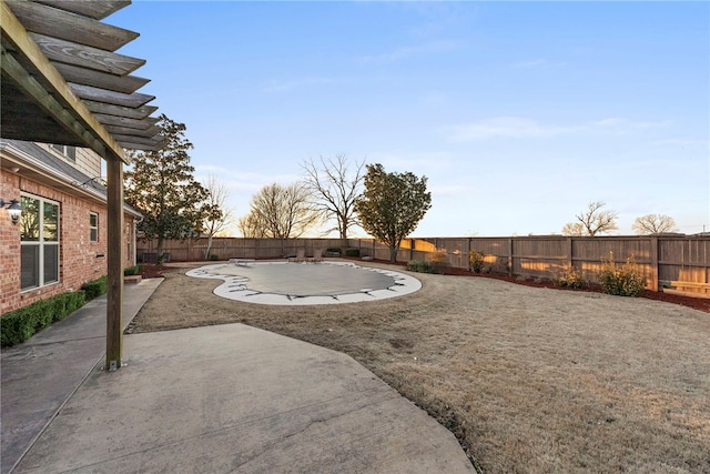 view of yard featuring a fenced backyard and a patio