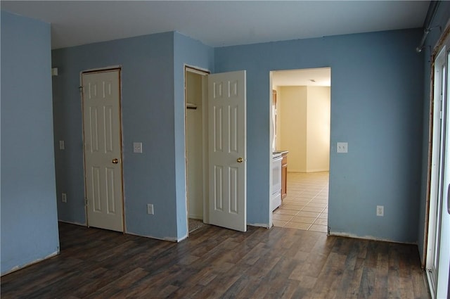 unfurnished bedroom featuring wood finished floors