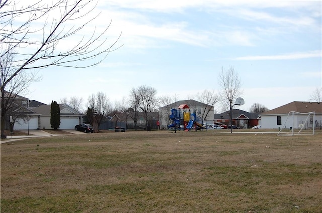 view of yard featuring playground community