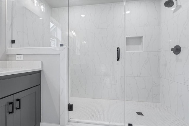 57 Cromarty Dr, Bella Vista, AR 72715 - bathroom featuring vanity and a marble finish shower