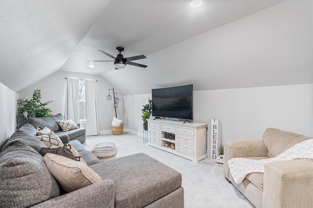 57 Cromarty Dr, Bella Vista, AR 72715 - carpeted living room featuring vaulted ceiling, a ceiling fan, and baseboards