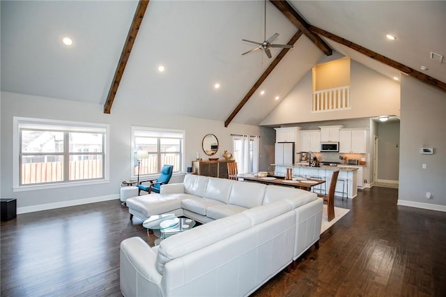 living room with high vaulted ceiling, dark wood finished floors, beam ceiling, and baseboards