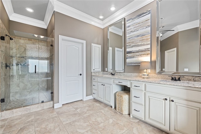 bathroom featuring double vanity, ornamental molding, a sink, and a shower stall