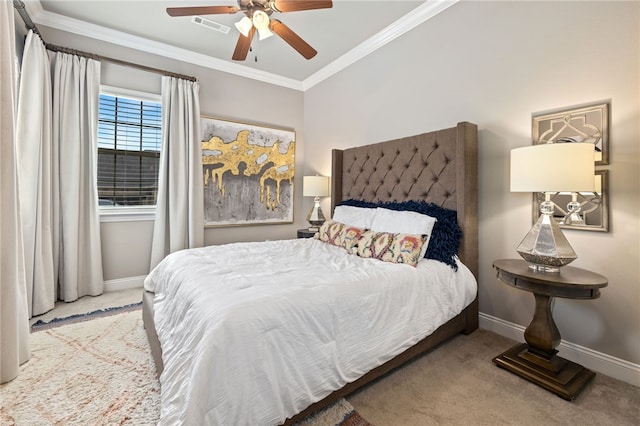 carpeted bedroom with ornamental molding, visible vents, ceiling fan, and baseboards