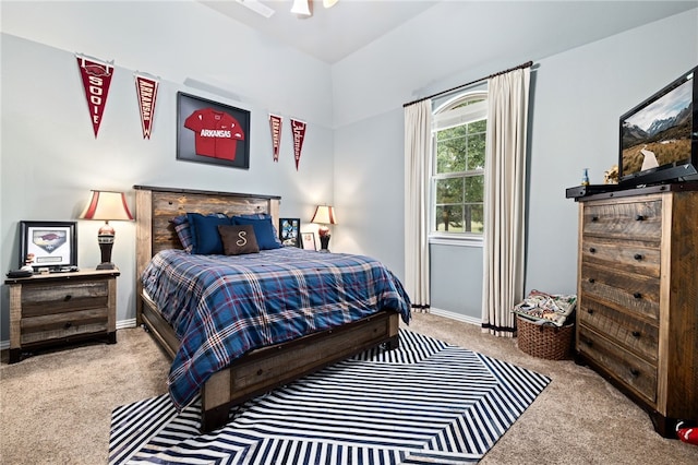 bedroom with carpet floors and baseboards