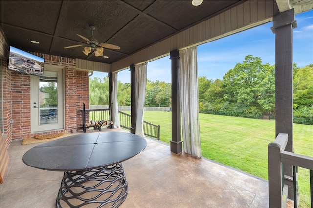 view of patio featuring ceiling fan