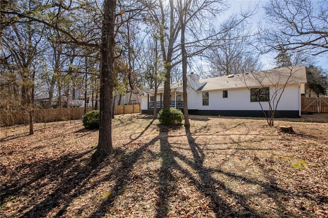 view of yard with fence