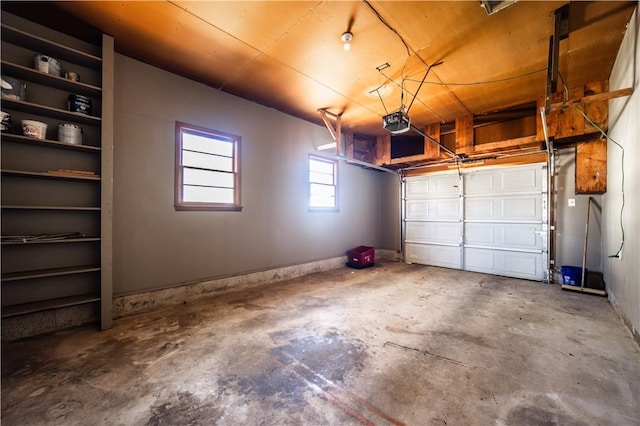 garage featuring a garage door opener