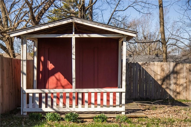 view of shed featuring a fenced backyard