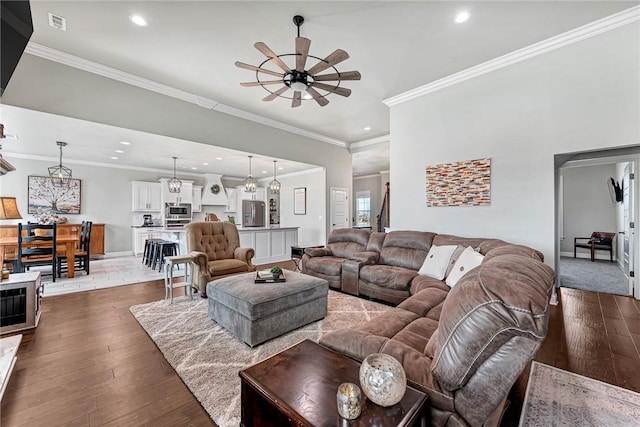 living room featuring dark wood finished floors and recessed lighting