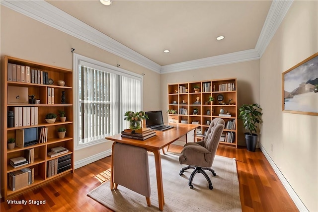 home office featuring crown molding, baseboards, and wood finished floors