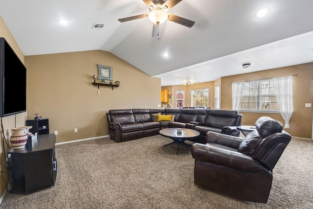 living room featuring visible vents, baseboards, lofted ceiling, ceiling fan, and carpet