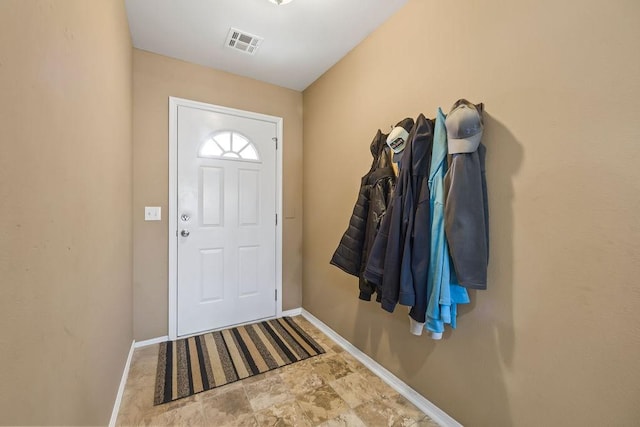 entrance foyer with visible vents and baseboards