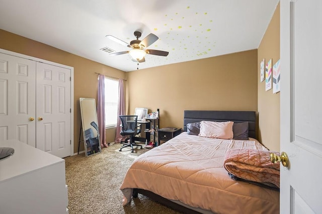 bedroom featuring a ceiling fan, a closet, carpet flooring, and visible vents