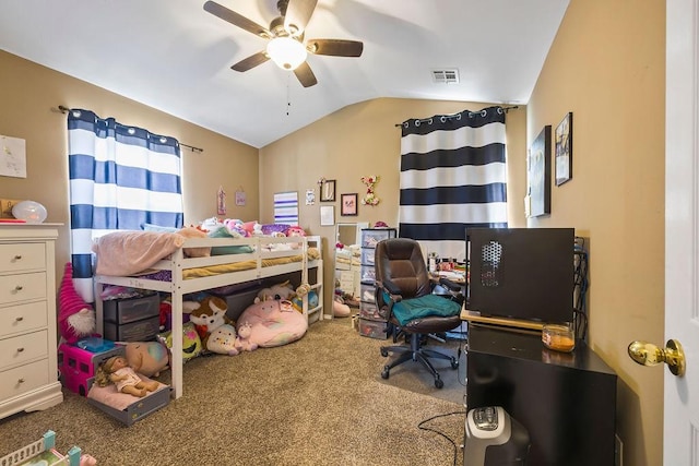 bedroom with carpet floors, visible vents, vaulted ceiling, and ceiling fan