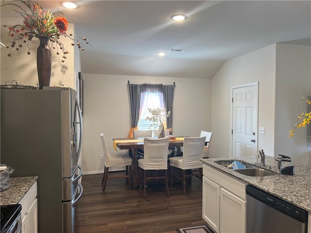 dining space with recessed lighting, visible vents, baseboards, vaulted ceiling, and dark wood finished floors