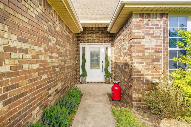 760 Napa Ave, Centerton, AR 72719 - property entrance featuring a shingled roof and brick siding