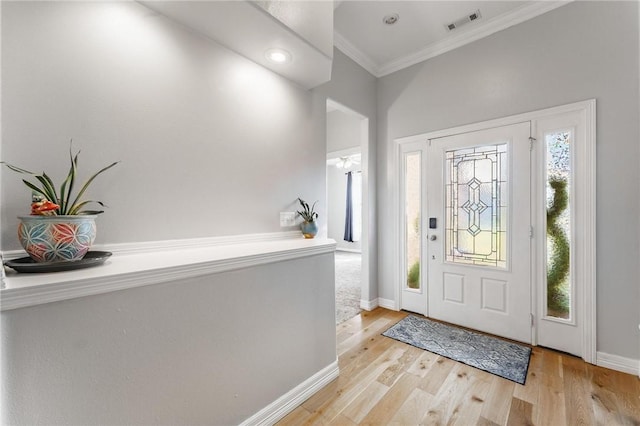 760 Napa Ave, Centerton, AR 72719 - entrance foyer featuring crown molding, light wood-style flooring, and baseboards