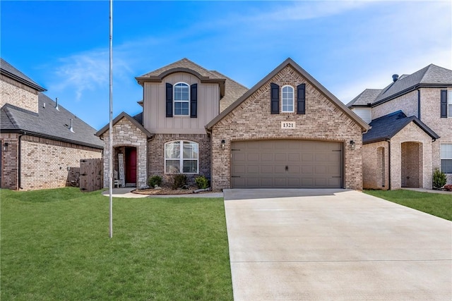 french provincial home featuring brick siding, an attached garage, board and batten siding, driveway, and a front lawn