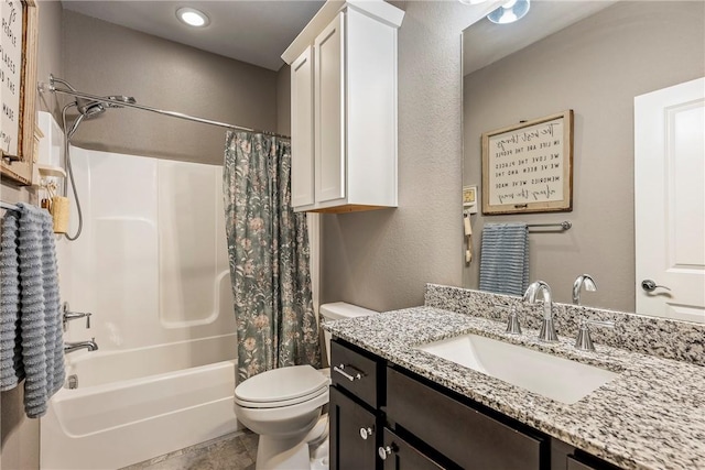 full bath featuring shower / tub combo, vanity, and toilet